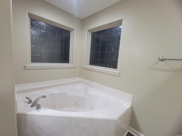 bathroom with a washtub