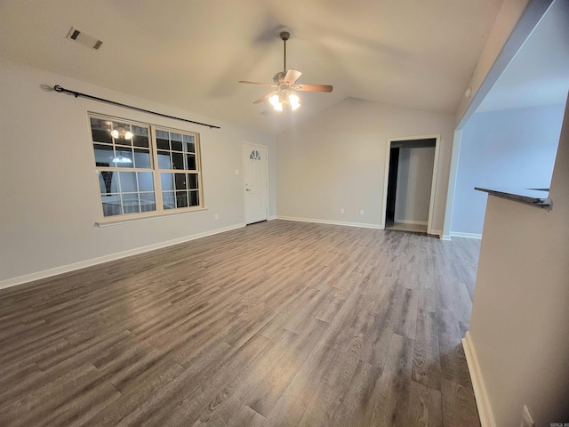 unfurnished living room featuring ceiling fan, vaulted ceiling, and hardwood / wood-style flooring