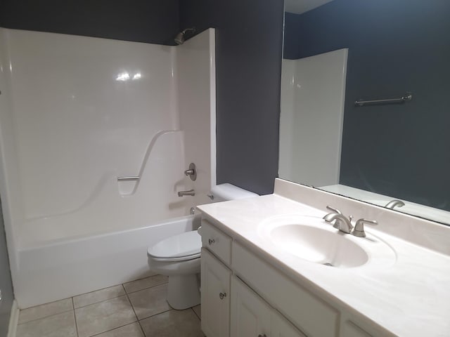 full bathroom with tile patterned flooring, vanity, toilet, and shower / washtub combination