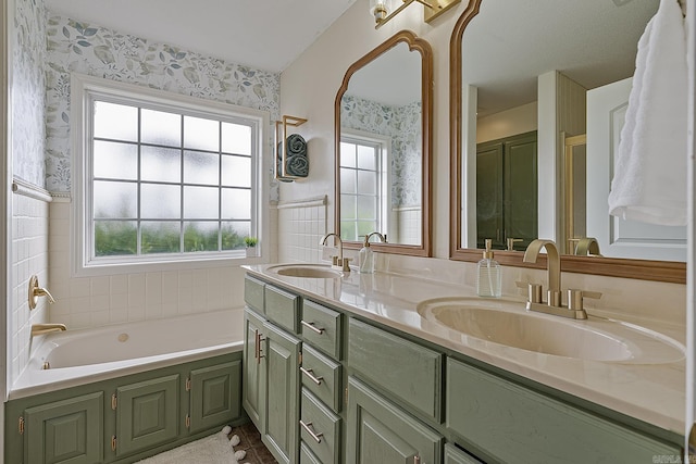 bathroom featuring vanity, tile walls, and a bathing tub