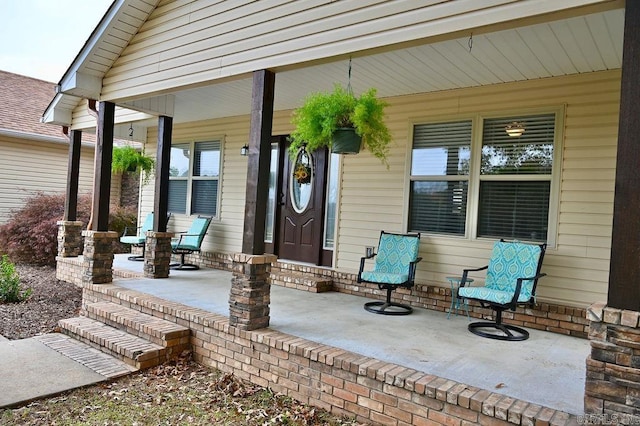 property entrance featuring a porch