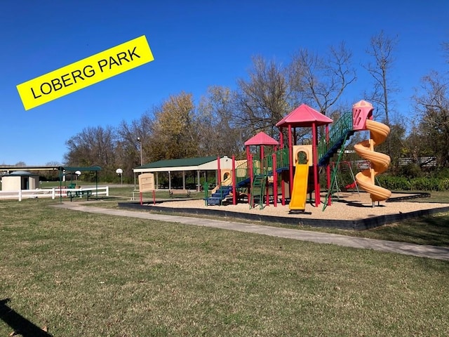 view of playground featuring a yard