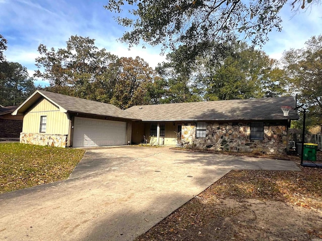 ranch-style home featuring a garage