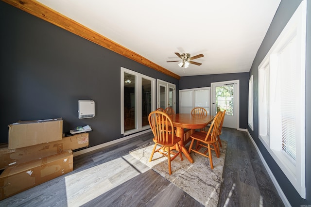 dining space featuring french doors, dark hardwood / wood-style floors, vaulted ceiling, and ceiling fan