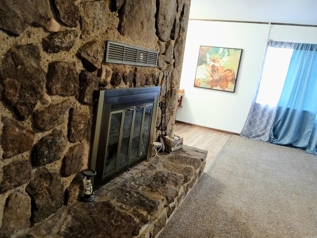 802 Casey St, Leslie, AR 72645 - detailed view of a fireplace and carpet floors