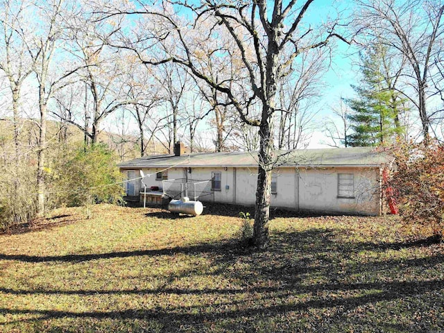 exterior space with a lawn