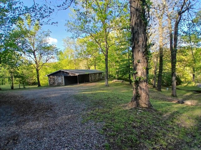 802 Casey St, Leslie, AR 72645 - view of yard with a pole building and an outbuilding