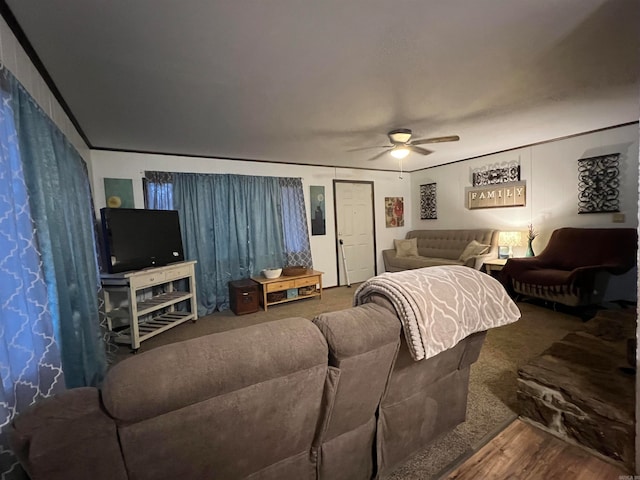 bedroom with ceiling fan and wood-type flooring