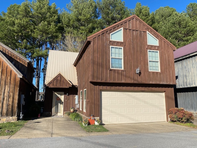 view of front of property with a garage