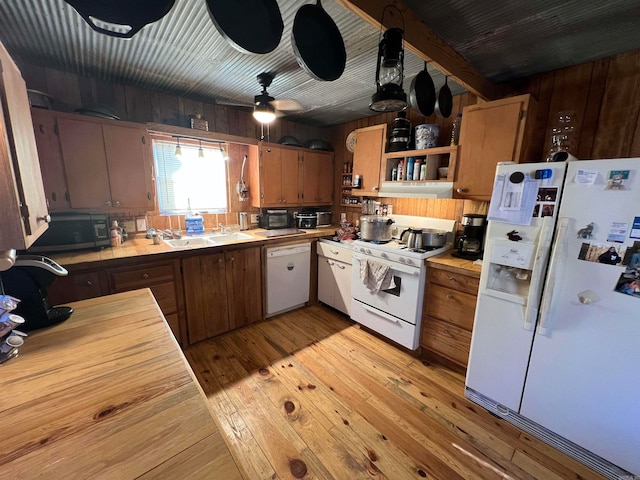 kitchen with ceiling fan, sink, light hardwood / wood-style floors, white appliances, and exhaust hood