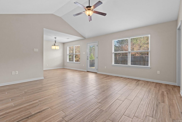 unfurnished living room with ceiling fan, light hardwood / wood-style floors, and vaulted ceiling