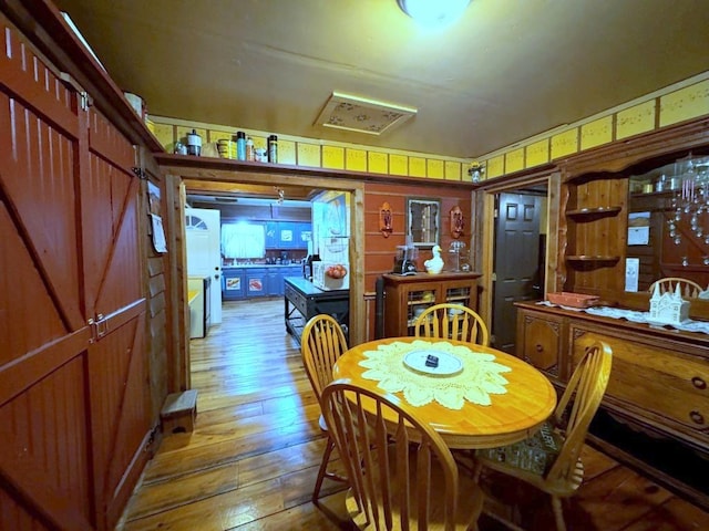 dining room featuring hardwood / wood-style flooring