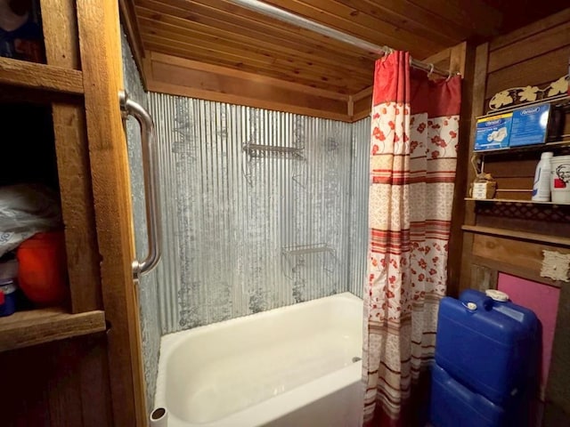 bathroom with shower / bath combo, wooden ceiling, and wood walls