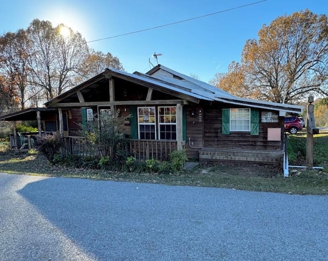 view of front of home featuring covered porch