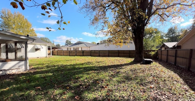 view of yard with a sunroom