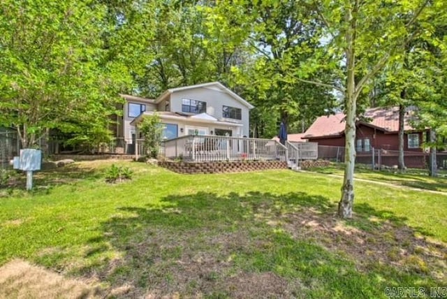 view of yard featuring a wooden deck