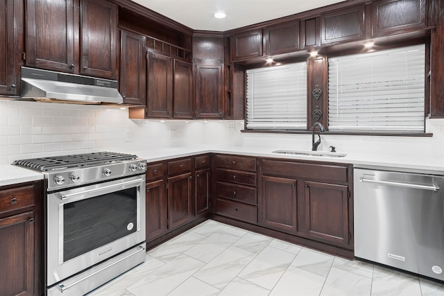 kitchen featuring decorative backsplash, dark brown cabinetry, sink, and appliances with stainless steel finishes