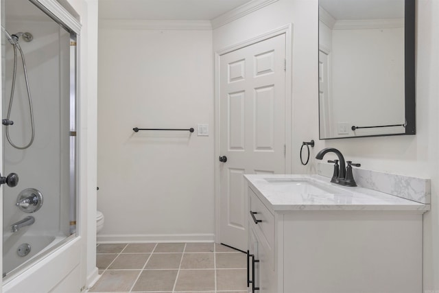 full bathroom featuring tile patterned floors, crown molding, toilet, vanity, and shower / bathtub combination