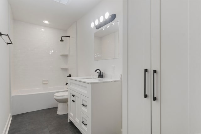 full bathroom with tiled shower / bath, tile patterned floors, vanity, and toilet