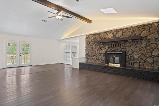 unfurnished living room with vaulted ceiling with beams, ceiling fan, french doors, and dark wood-type flooring