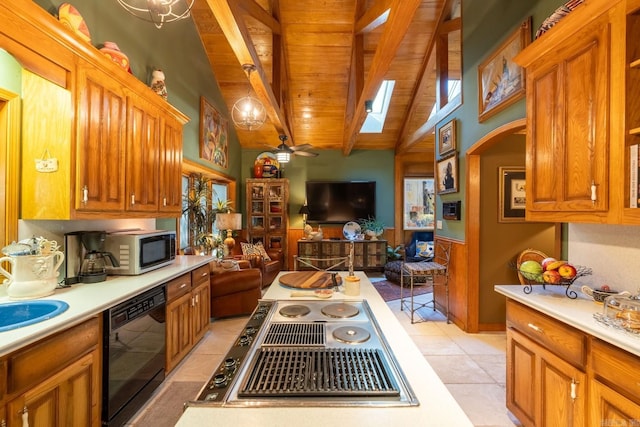 kitchen with dishwasher, light tile patterned floors, vaulted ceiling with beams, and stainless steel gas cooktop