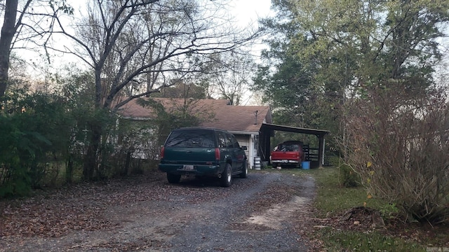 exterior space featuring a carport