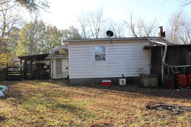 view of home's exterior featuring a lawn