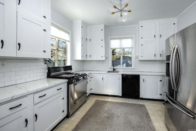 kitchen with decorative backsplash, stainless steel fridge, gas range oven, dishwasher, and white cabinetry