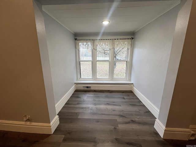1905 Bethesda, Mena, AR 71953 - empty room with ornamental molding, baseboards, and dark wood finished floors