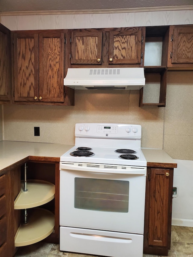 kitchen featuring tasteful backsplash, white electric range, and ventilation hood