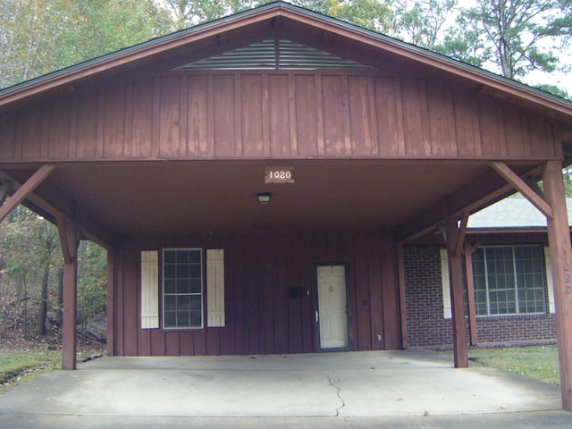 view of front of property featuring a carport