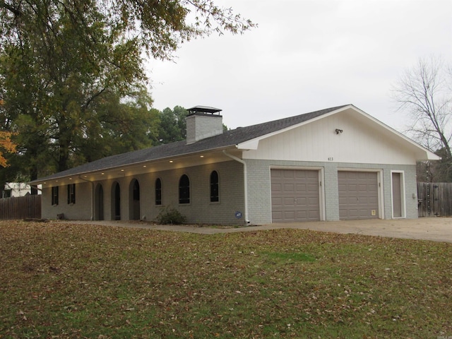 ranch-style house featuring a garage