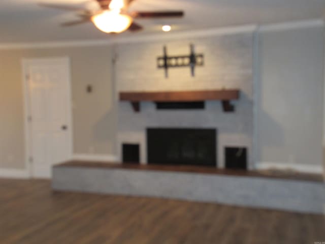 unfurnished living room featuring ceiling fan and wood-type flooring