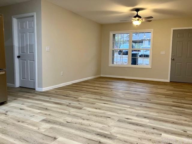 interior space with light hardwood / wood-style floors and ceiling fan