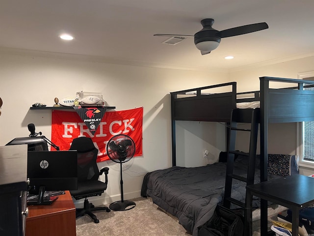 bedroom featuring carpet flooring, ceiling fan, and crown molding