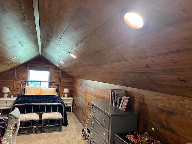 carpeted bedroom featuring wood walls, wooden ceiling, and vaulted ceiling