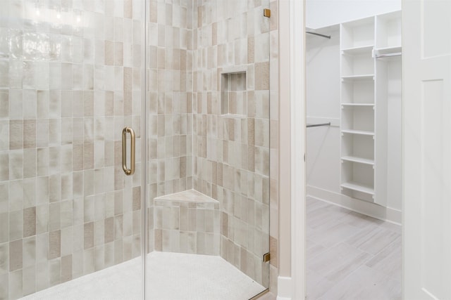 bathroom featuring walk in shower