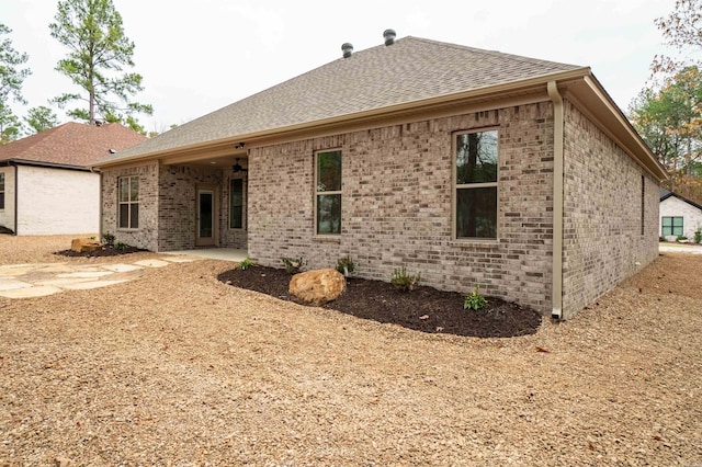 back of house featuring a patio area