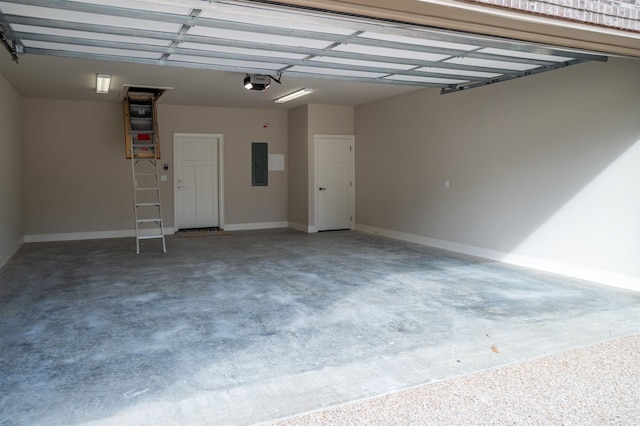 garage featuring electric panel and a garage door opener