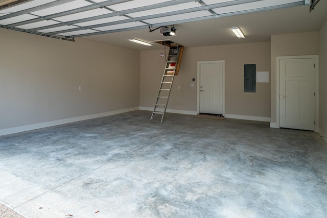 garage featuring electric panel and a garage door opener