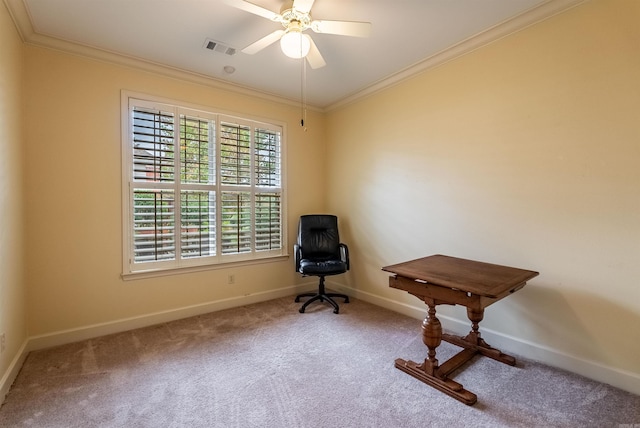 living area featuring carpet flooring, ceiling fan, and ornamental molding