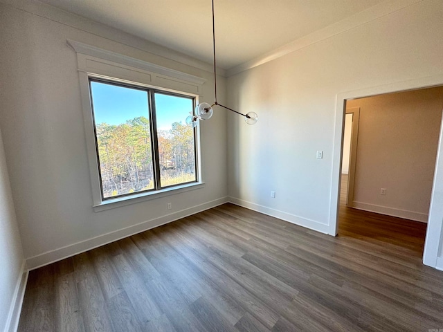 unfurnished dining area with dark hardwood / wood-style flooring