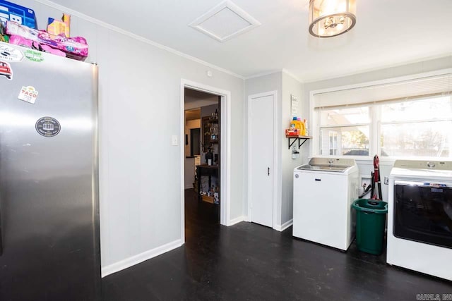 washroom featuring independent washer and dryer and crown molding