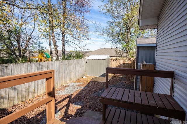 deck featuring a shed