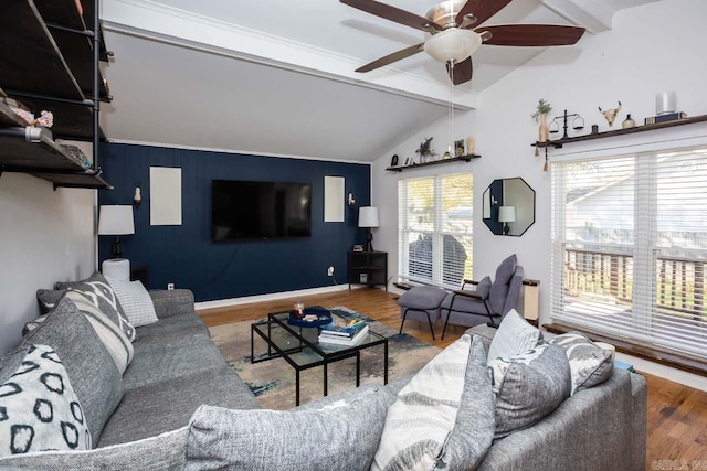 living room featuring vaulted ceiling with beams, hardwood / wood-style flooring, and ceiling fan