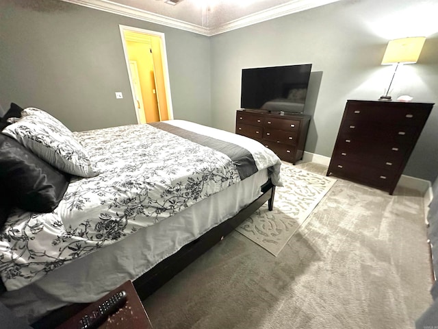 bedroom featuring carpet flooring and crown molding