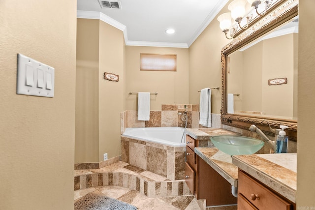 bathroom featuring vanity, ornamental molding, and tiled tub