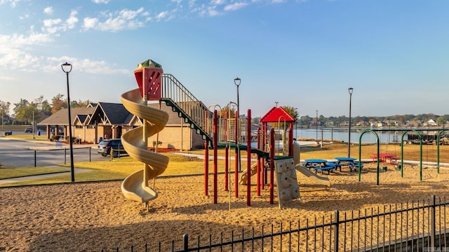 view of play area featuring a water view