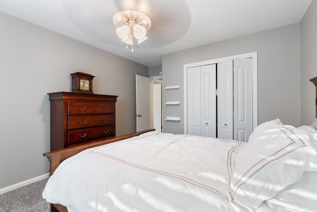 bedroom featuring carpet flooring, ceiling fan, and a closet