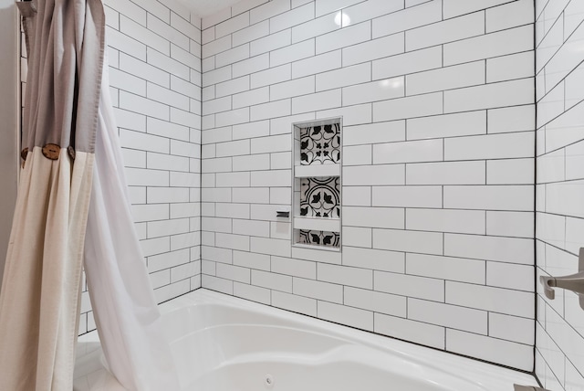 bathroom featuring shower / tub combo with curtain